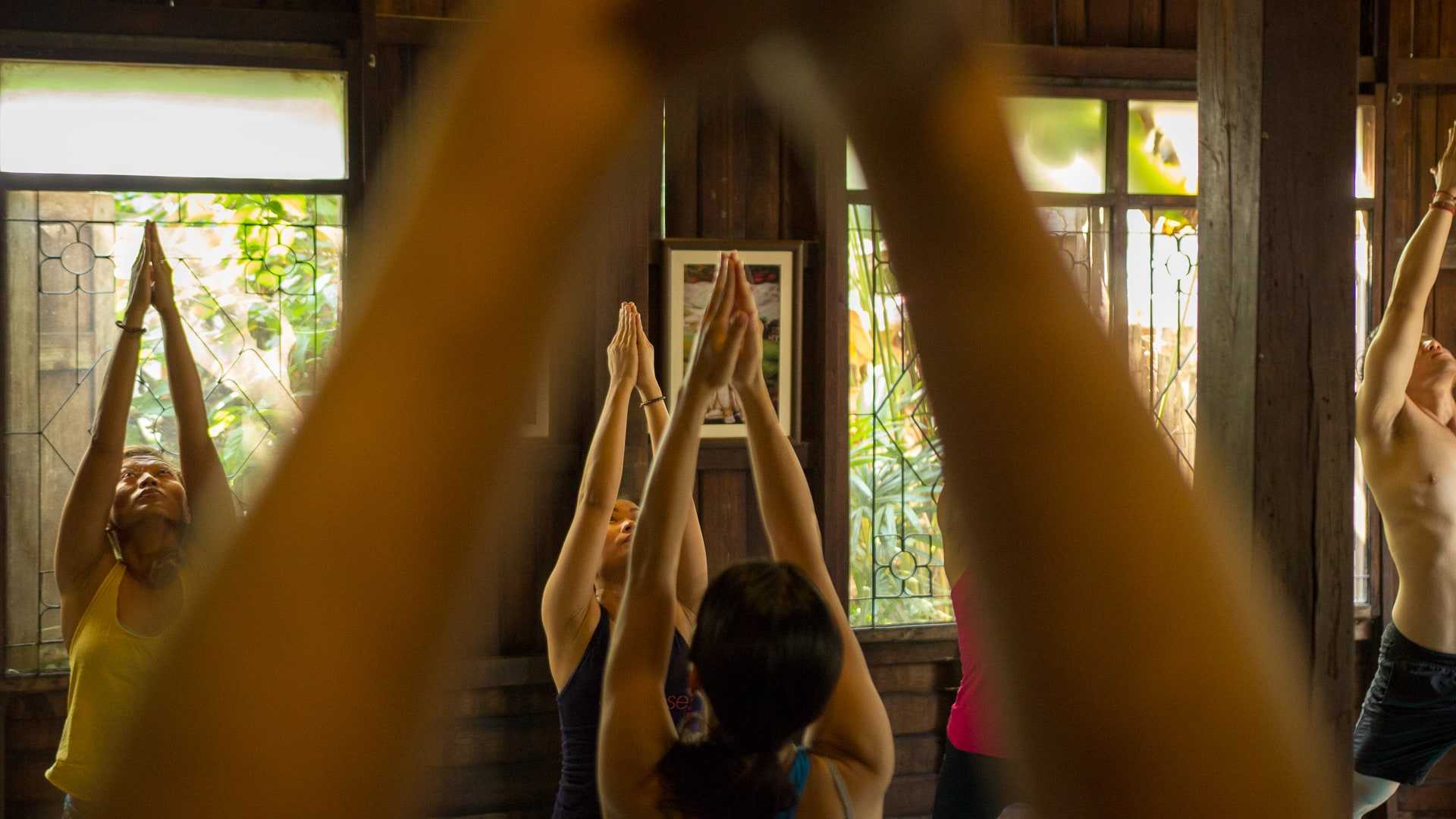 Morning yoga class at Wild Rose Yoga Studio Chiang Mai Thailand Old City.