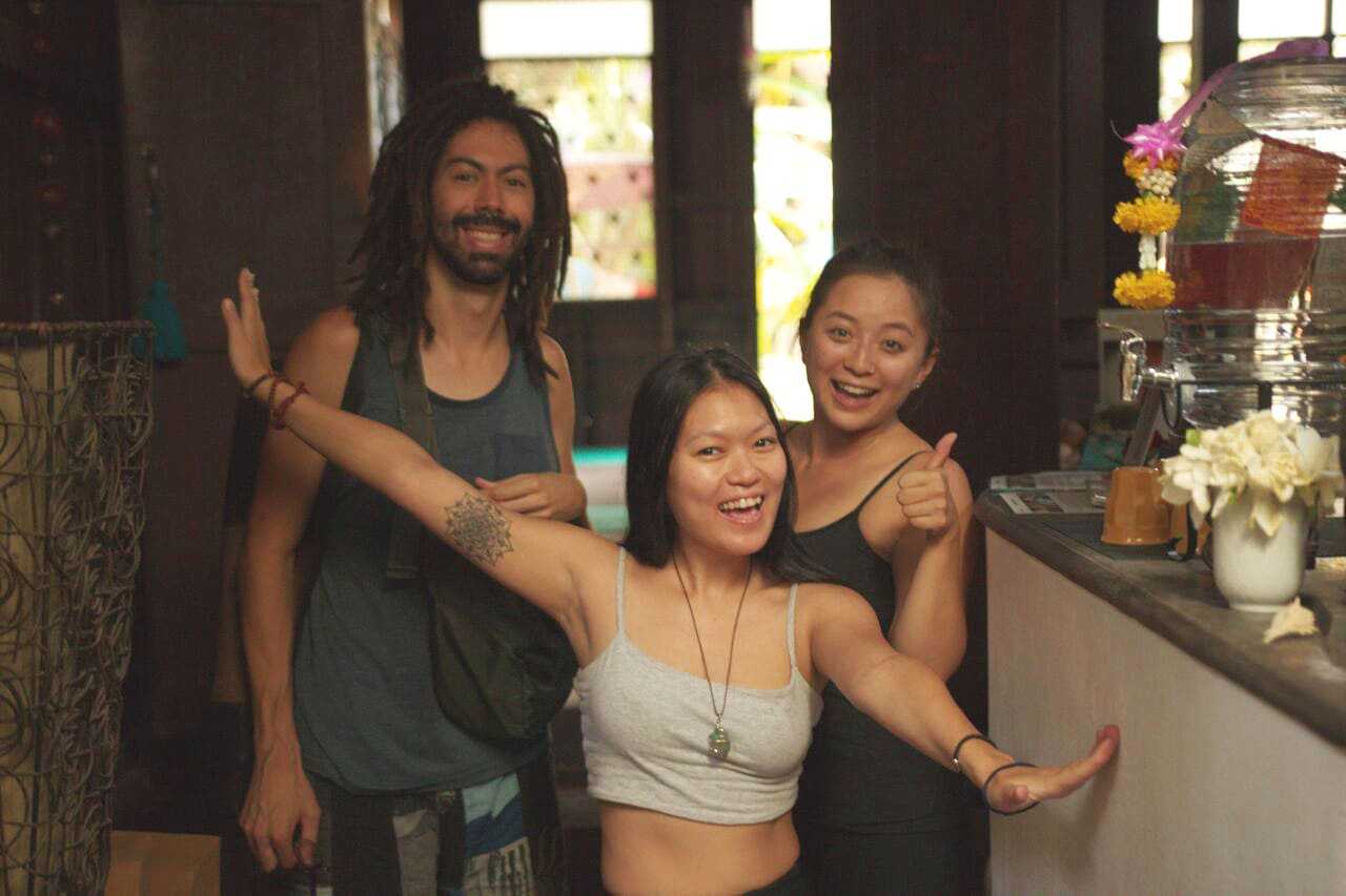 Yoga students hanging out after a yoga class at Wild Rose Yoga Studio Old City Chiang Mai Thailand.